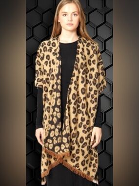 Do everything in Love Brand Cozy Soft Leopard Print Kimono. One Size